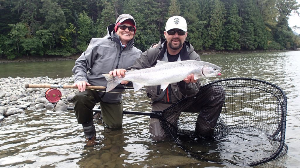 Gwen from Texas gets her very first wild Steelhead on the fly